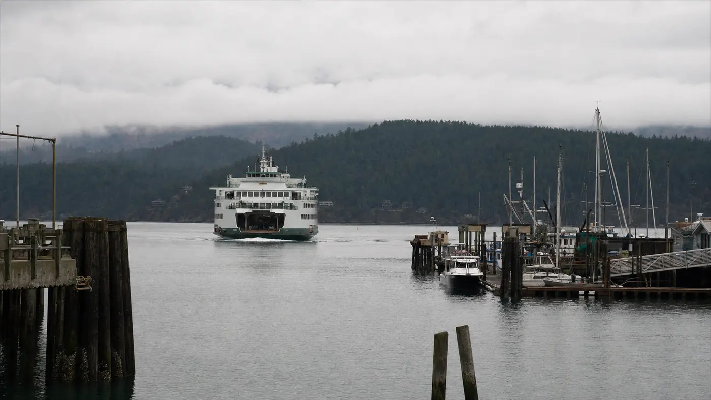 A Washington State ferry approaching the dock at Friday Harbor on a gray morning